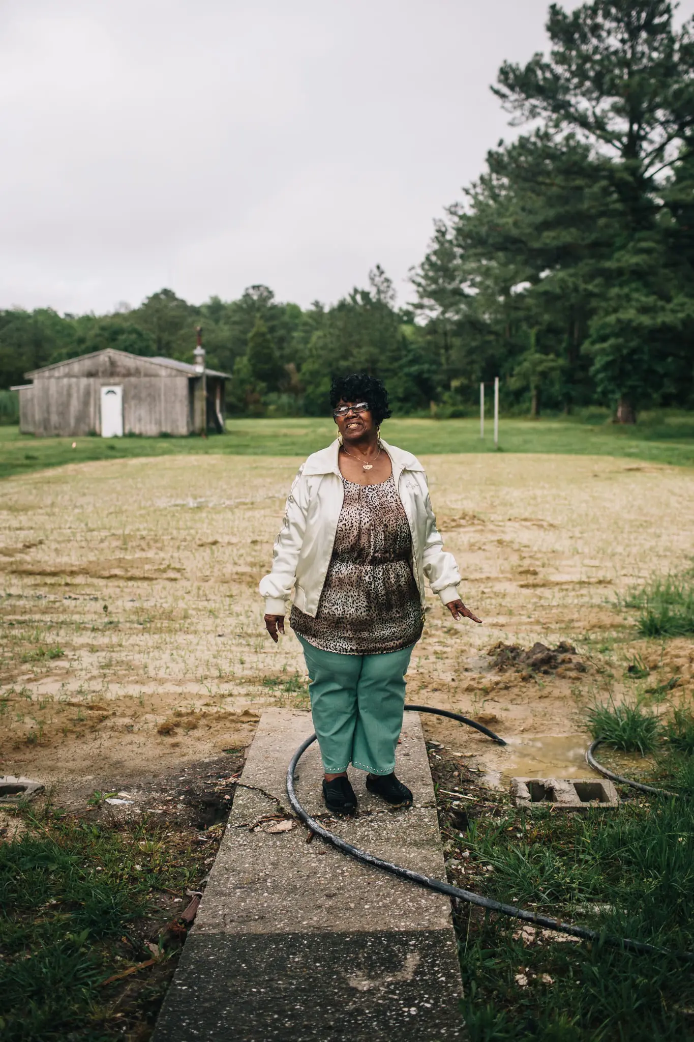 Ruth Fountain stands where her home used to be before Hurricane Sandy.