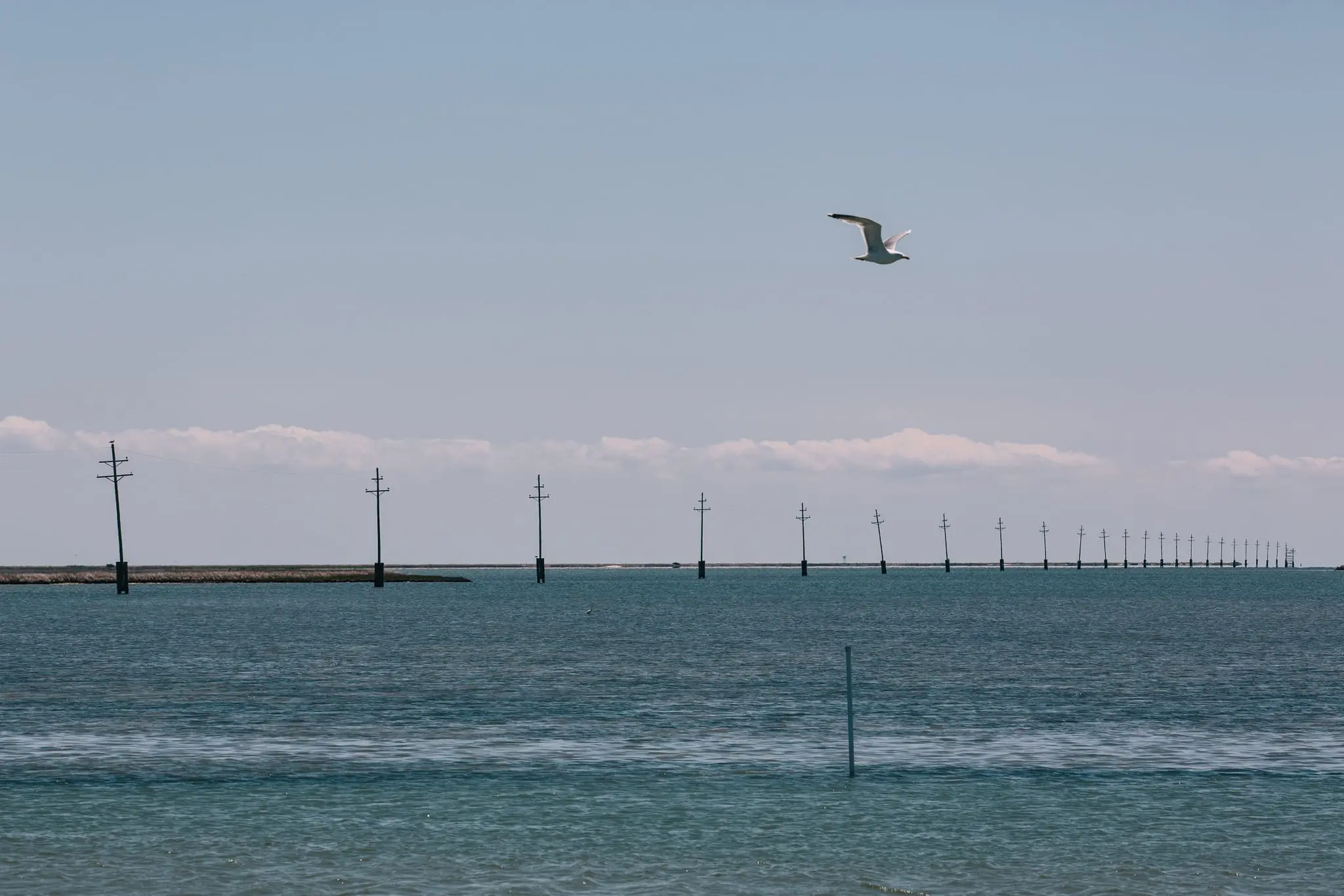 Power lines stretch from Rhodes Point to Tangier Island.