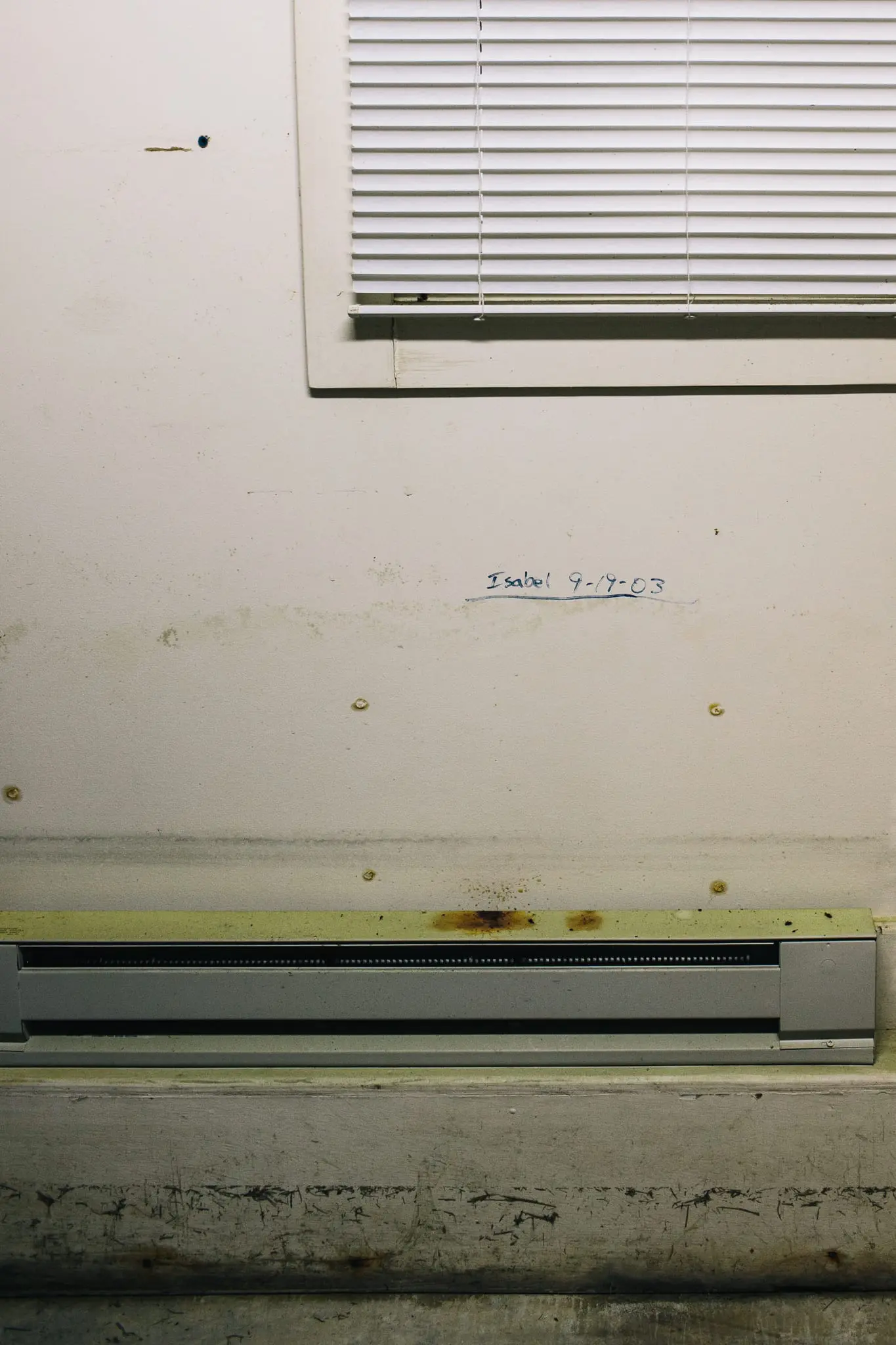 A watermark from Hurricane Isabelle at John Tall Sr.'s workplace.