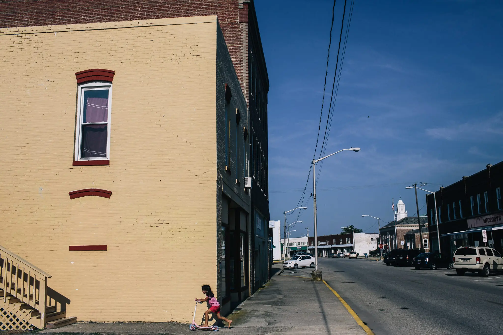 Vanessa Hernandez, 5, plays on Crisfield's Main Street.