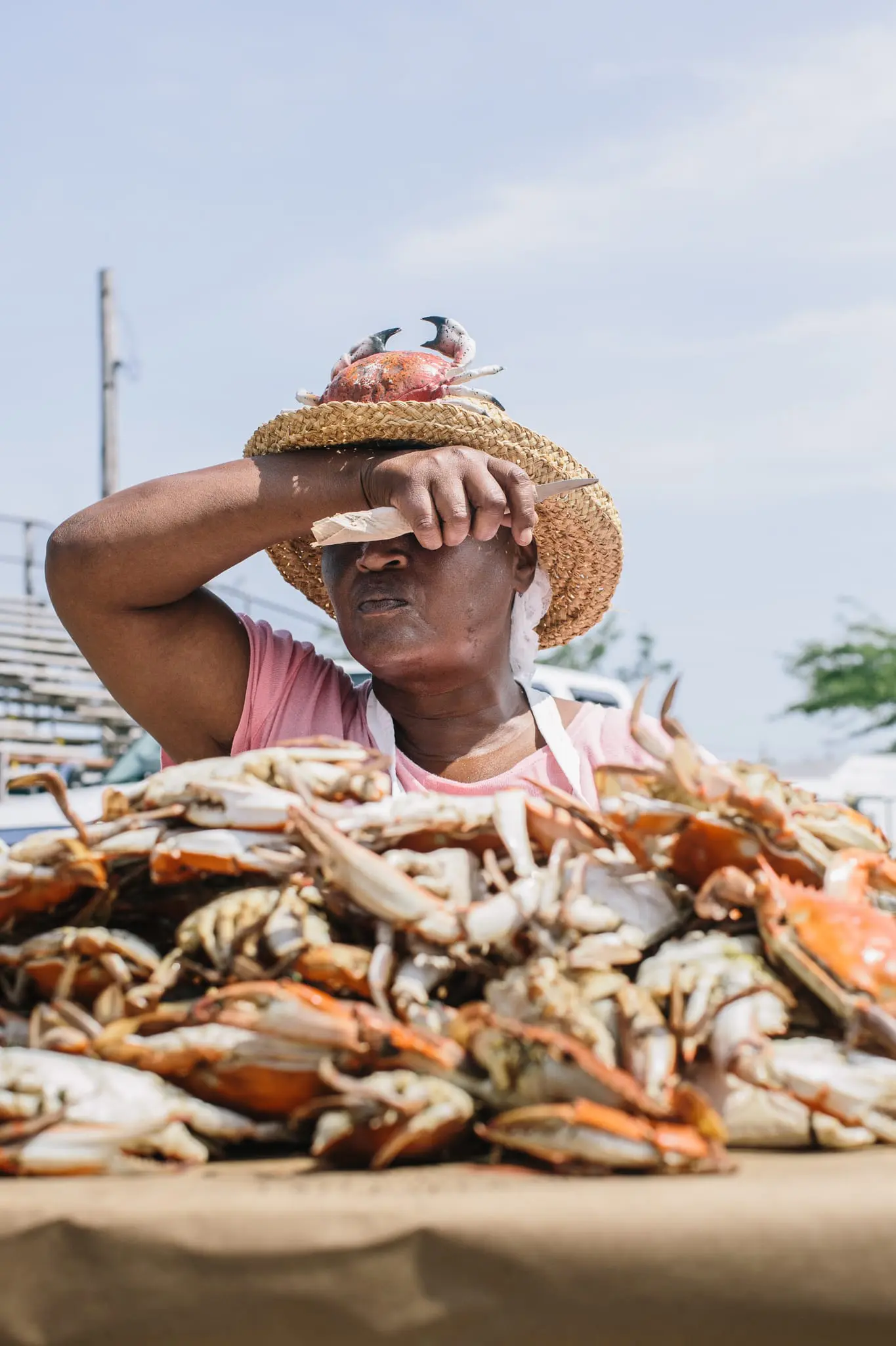 Ruth Schoolfield pauses during the annual crab picking competition.
