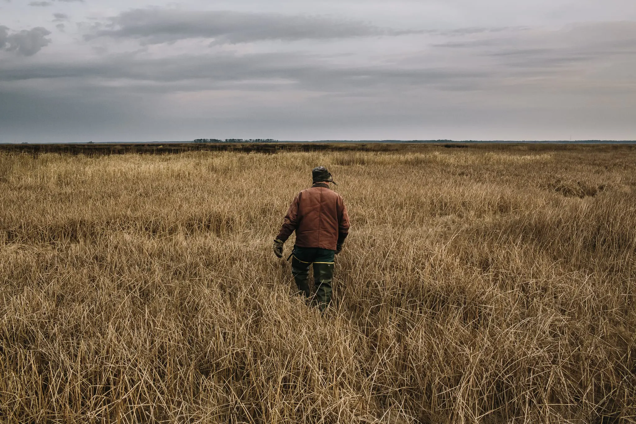 Phil Jackson heads out to set traps in Blackwater NWR.