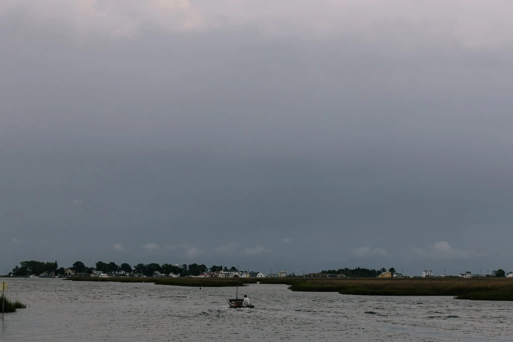 A waterman takes a boat from Rhodes Point to Tylerton.