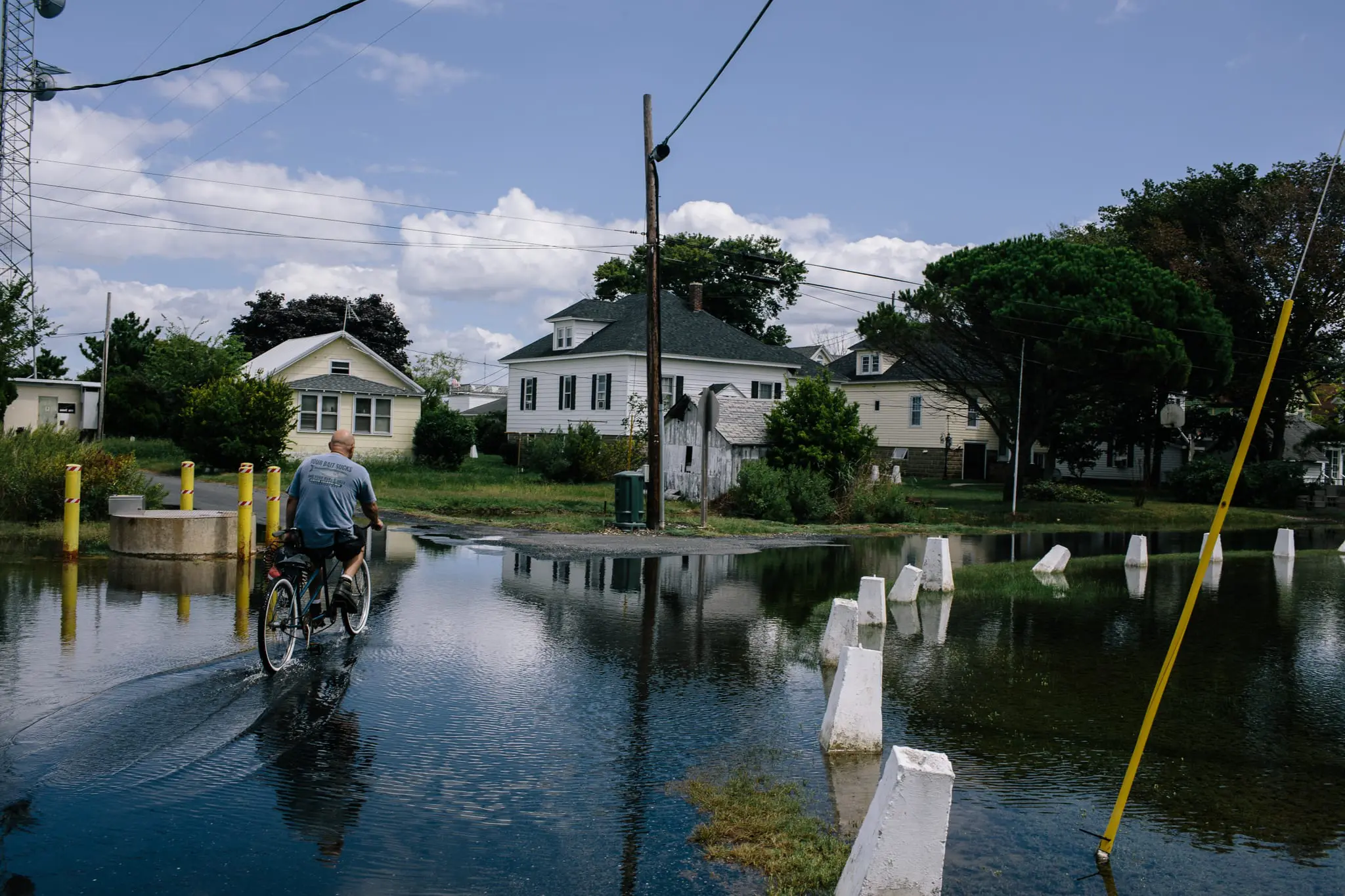 High tide floods the road in Ewell on Smith Island.
